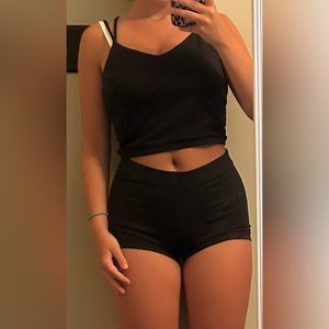 black crop top with a cross in the back